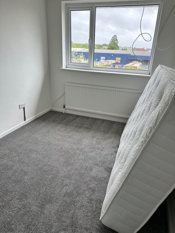 Photo 1: Larger room