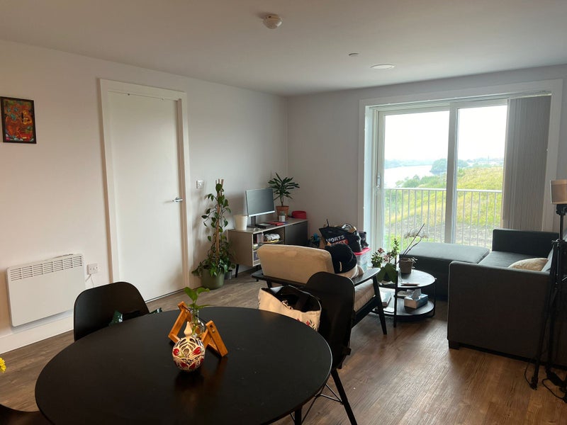 Photo 1: Living Room + Kitchen