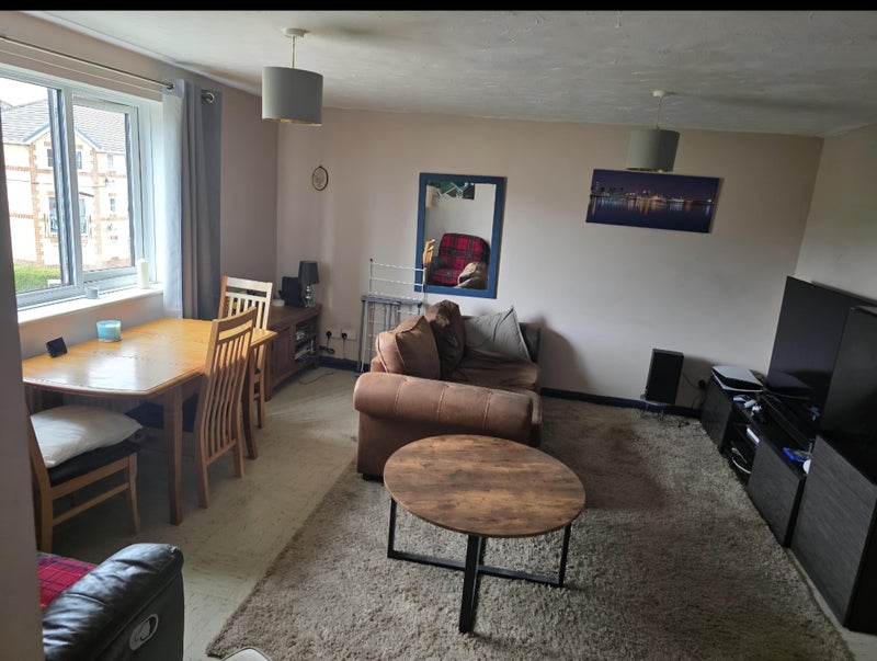 Photo 1: It's a top floor flat, but only two stories high.