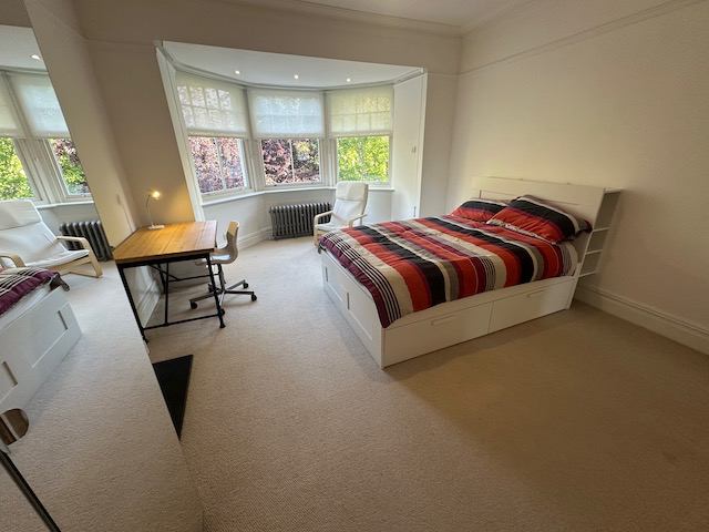 Photo 1: 1st bedroom