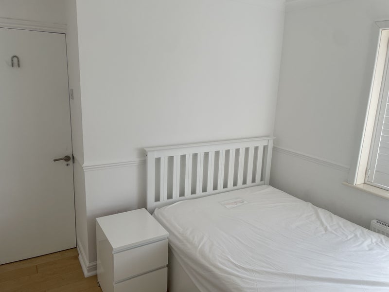 Photo 1: Storage bed