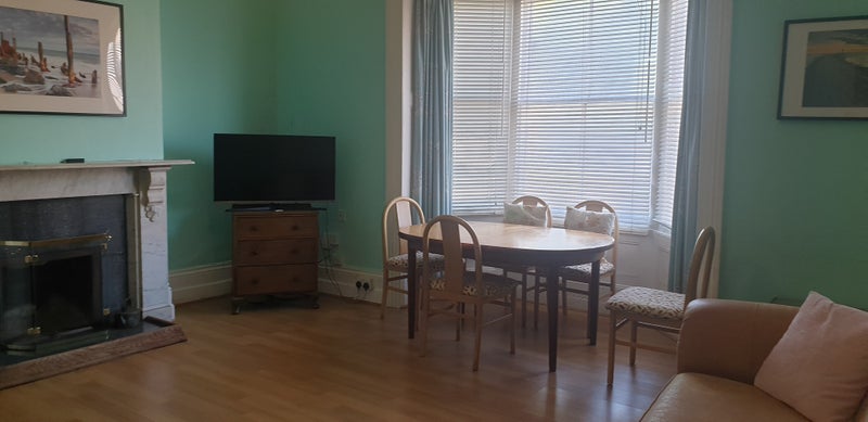 Photo 1: Shared living room