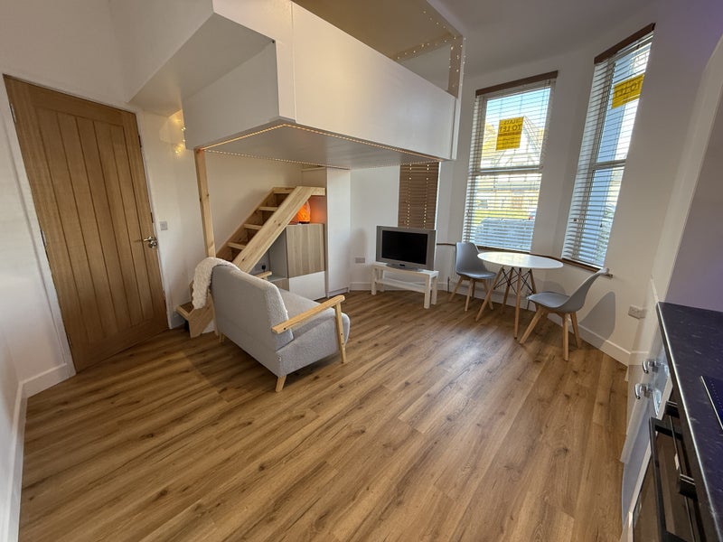 Photo 1: View of Flatlet