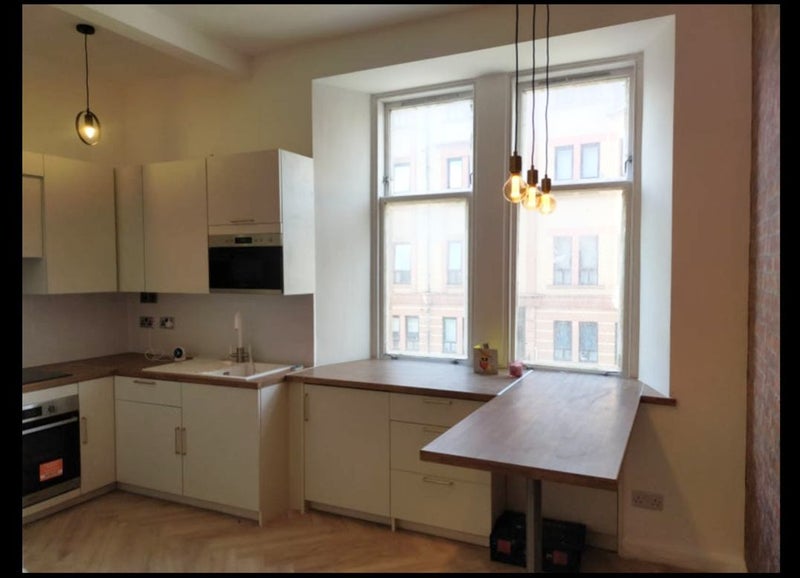 Photo 1: Kitchen with breakfast bar 