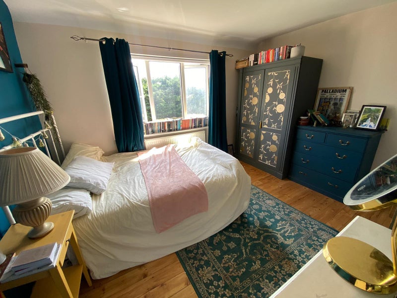 Photo 1: Large garden-facing double bedroom