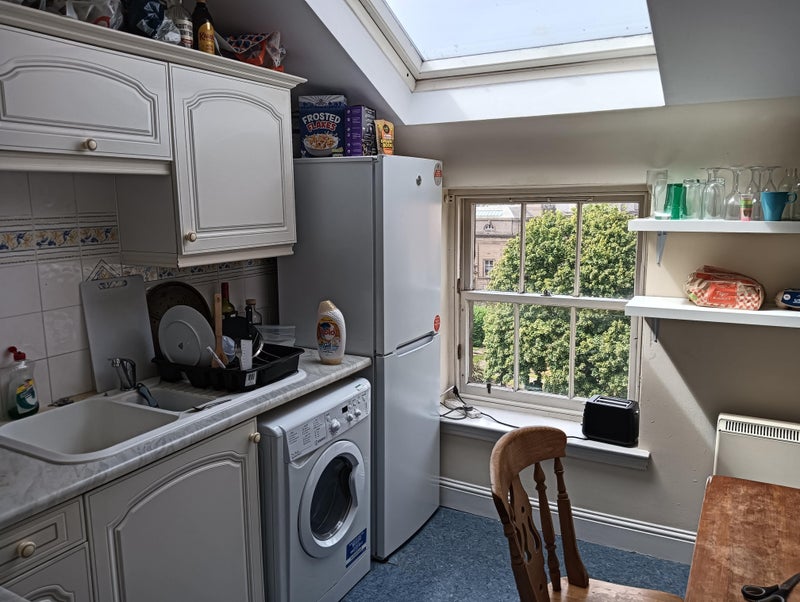 Photo 1: Kitchen/Dining room