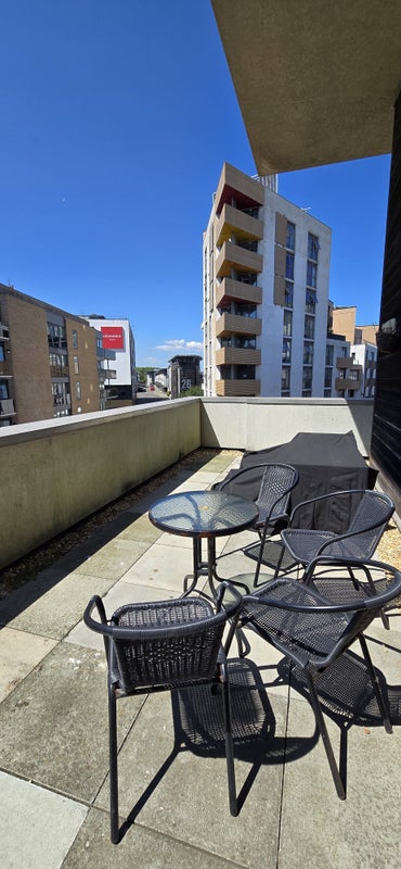 Photo 1: Wraparound balcony