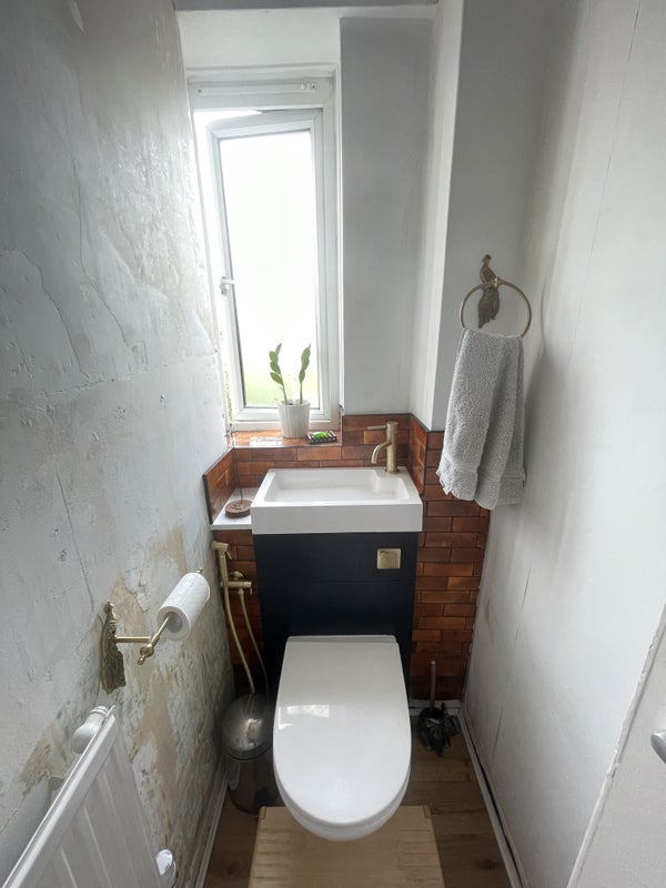 Photo 1: New toilet with new tiling. Will be painted soon!