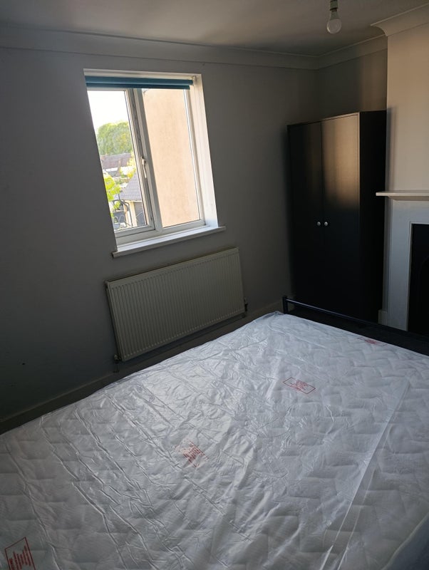Photo 1: A New double bed and a wardrobe.
