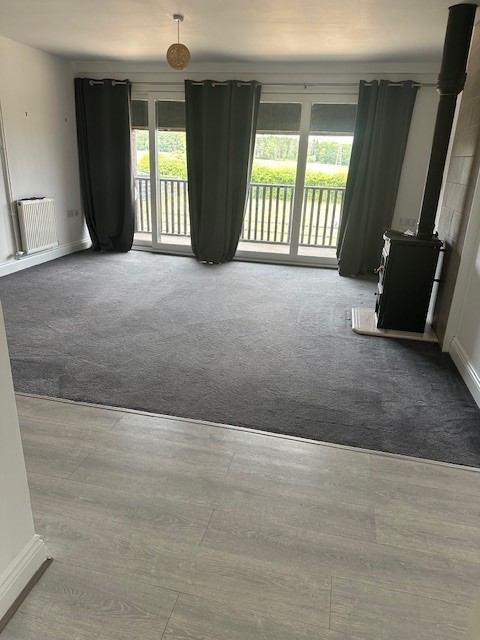 Photo 1: Living area.