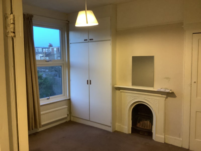 Photo 1: Room 1 (upstairs, back of house)