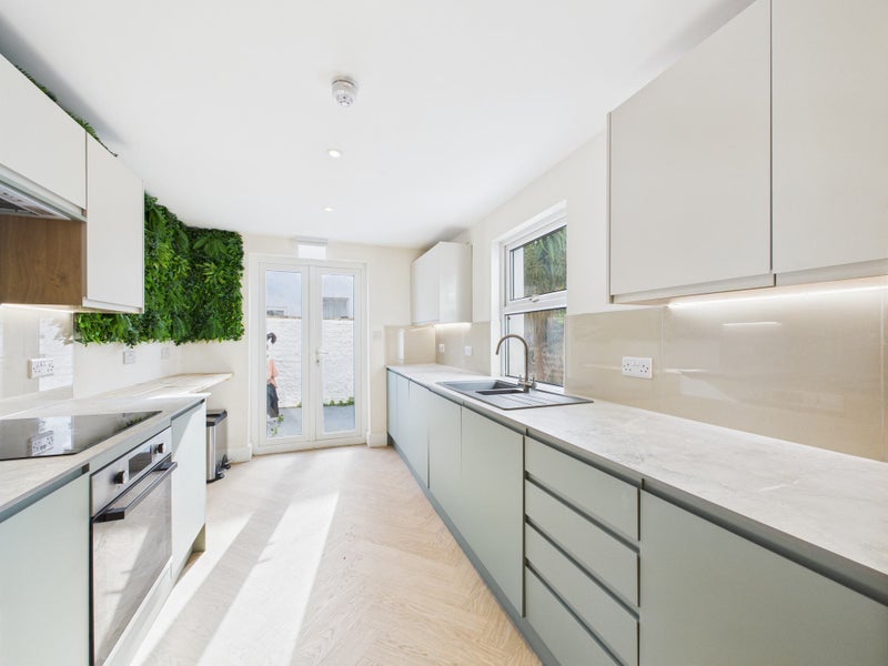 Photo 1: Communal kitchen