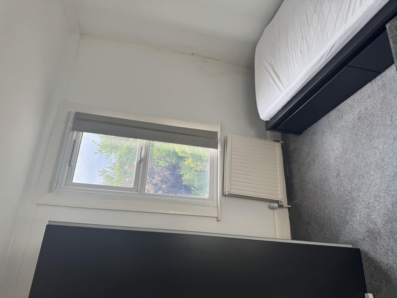 Photo 1: This is single room with shared bathroom 