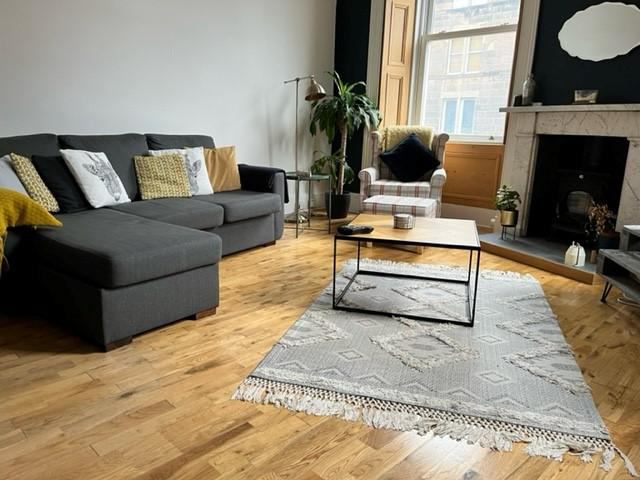 Photo 1: The living room! It's a little more colorful now and has some added decor :)