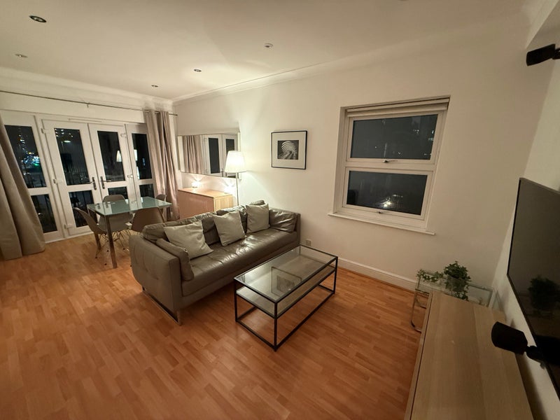 Photo 1: Living/dining room with dual aspect and Juliet balcony