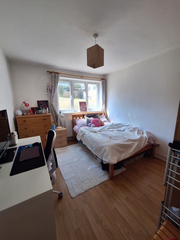 Photo 1: Bedroom fully furnished & how it looks now
