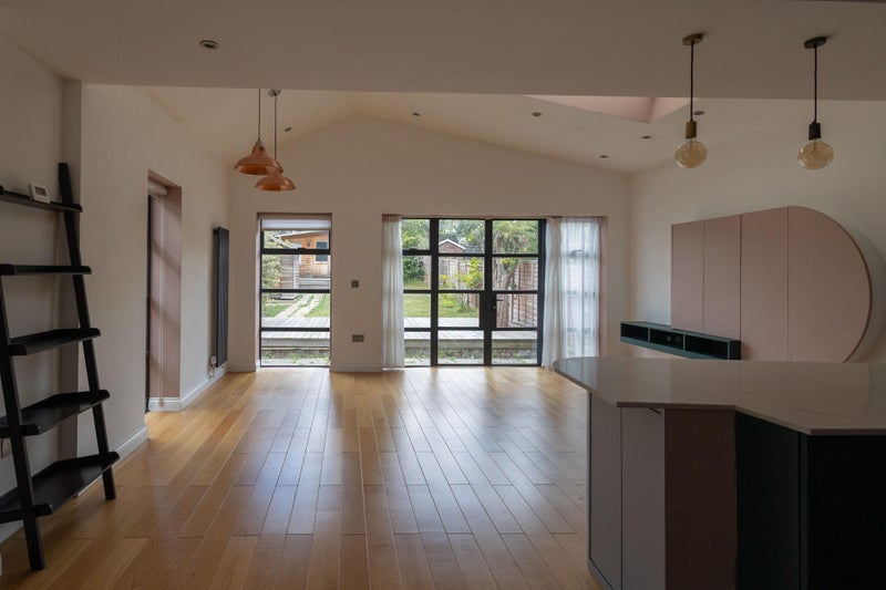 Photo 1: open plan kitchen and dining