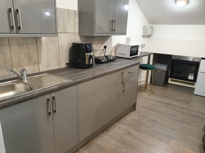 Photo 3: Under counter Fridge and Oven