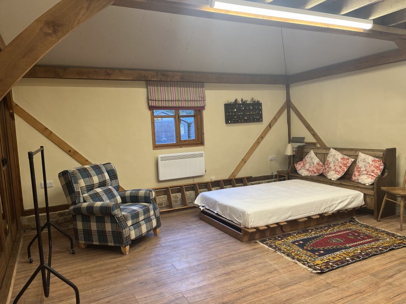 Photo 1: Bed sitting space with double bed, hanging space and comfortable armchair