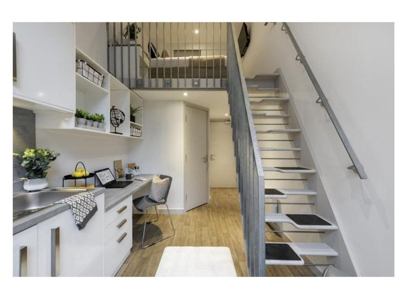 Photo 1: Studio Apartment