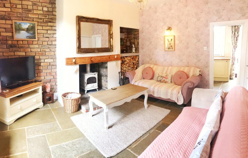 Photo 1: We have a dog free lounge and a second lounge where the furbabies have their own couches