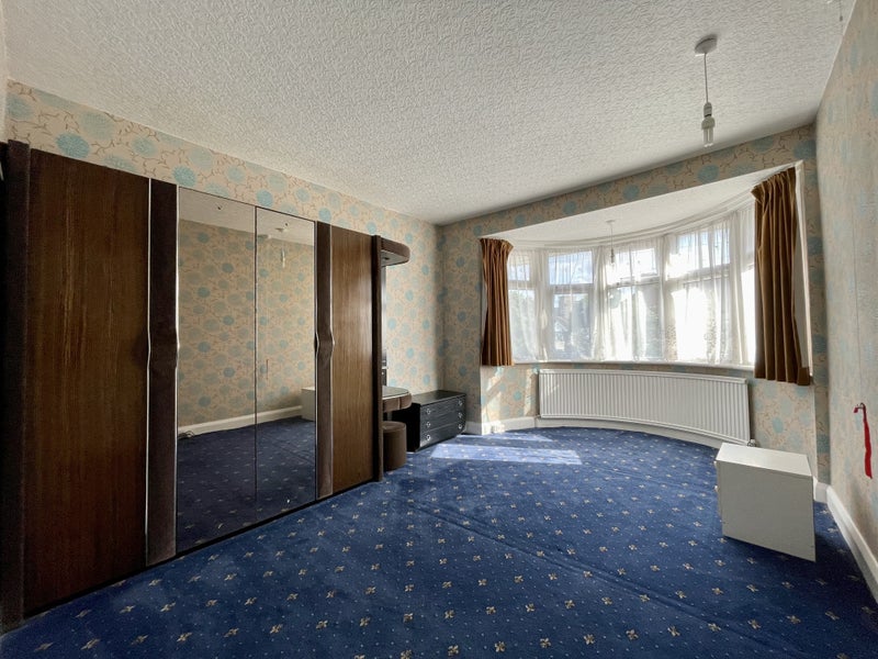 Photo 1: Front Room: Large double room, with storage