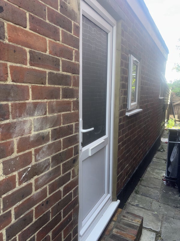 Photo 1: Front Of Garage