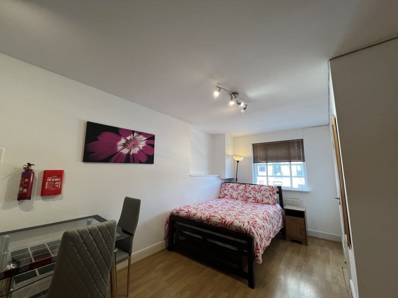 Photo 1: Double Bed + Dining Desk