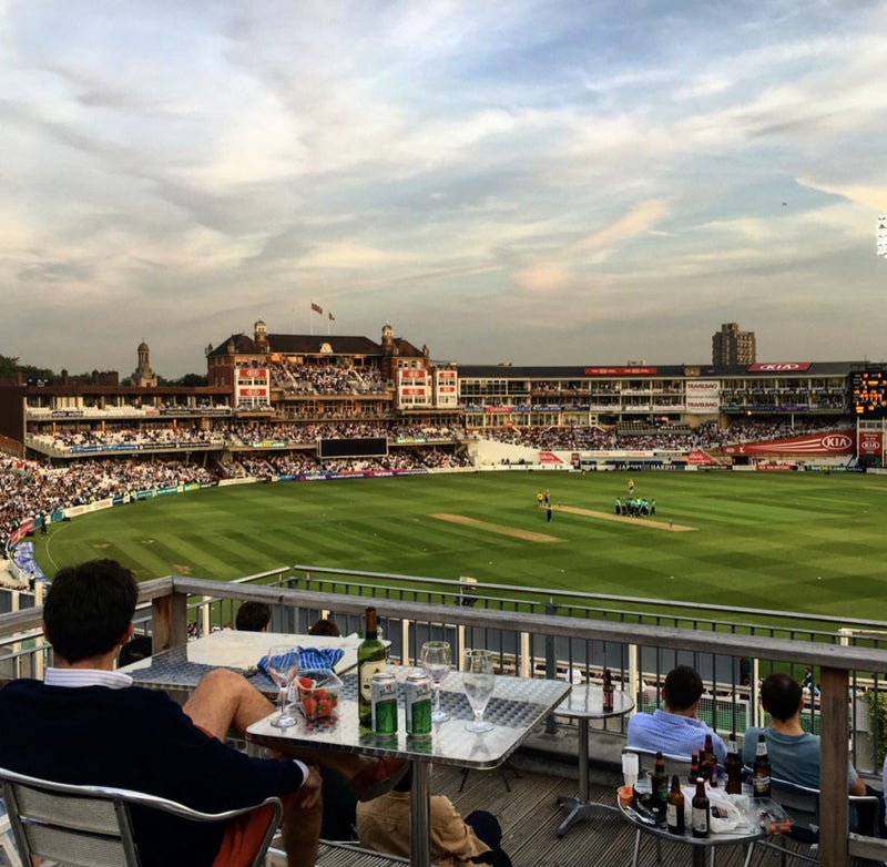 Photo 1: Shared balcony overlooks Oval stadium