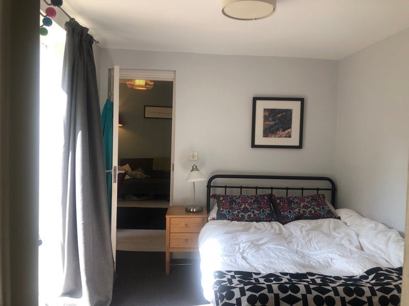 Photo 1: View from bedroom to sole use living area 