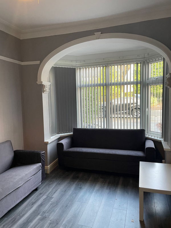 Photo 1: Communal living room