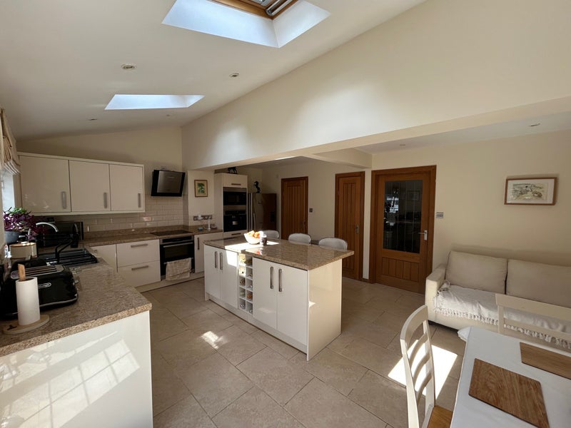Photo 1: Shared open plan kitchen