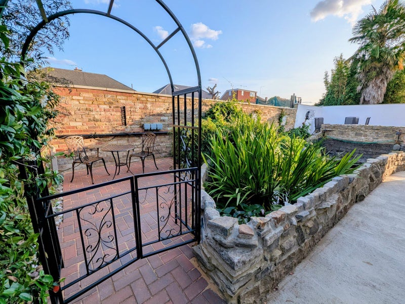 Photo 1: Private garden for one of the rooms