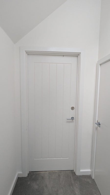 Photo 1: Room door with key