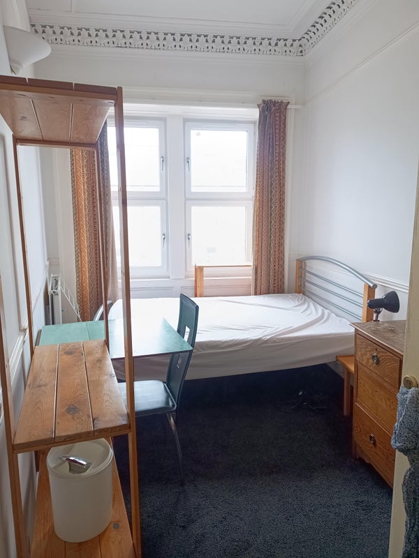 Photo 7: Bedroom with desk and chair added