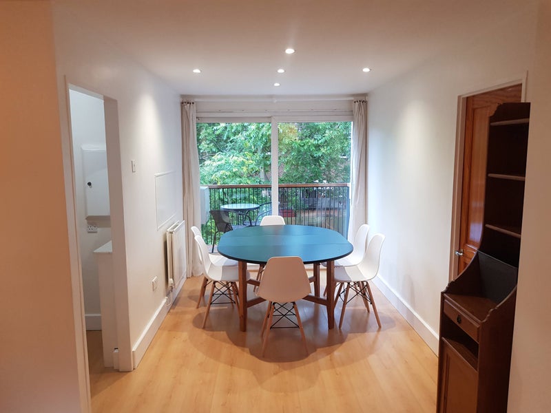 Photo 1: Dining area and balcony 