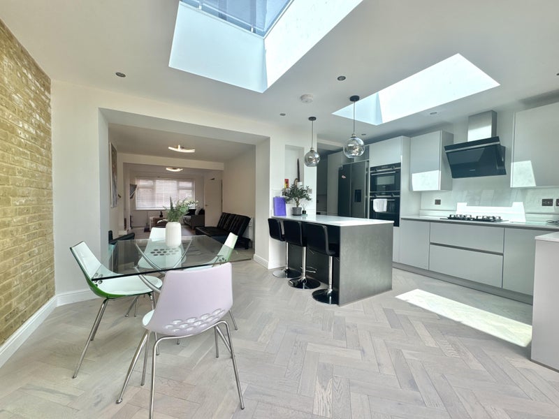 Photo 1: Open plan kitchen