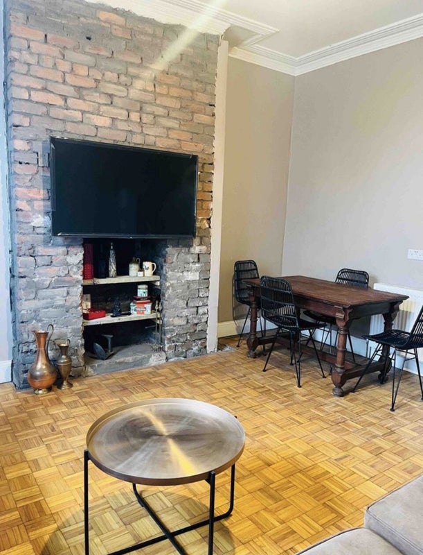 Photo 1: Front room
