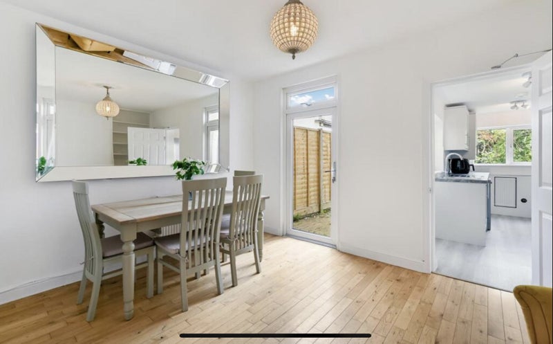 Photo 1: living/dining room