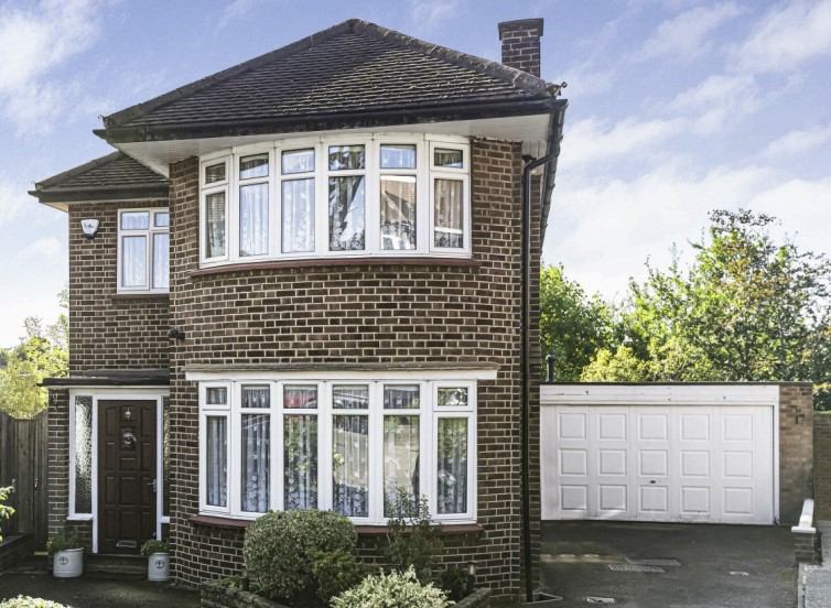 Photo 1: Front of house