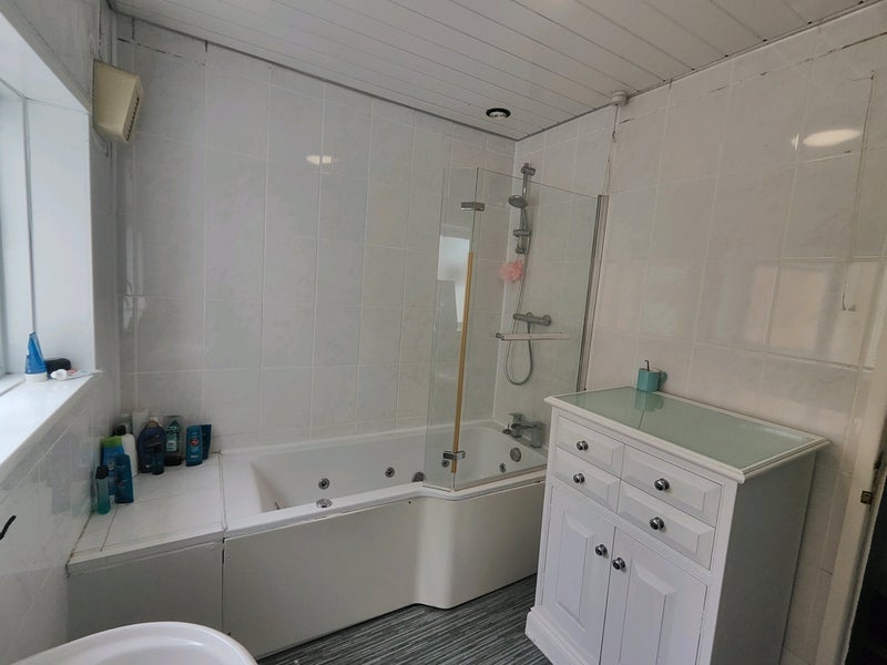 Photo 1: Shared bathroom