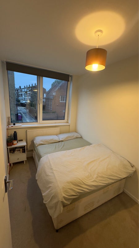 Photo 1: Single bed