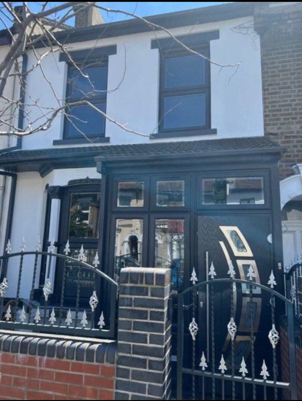 Photo 1: Front of the house