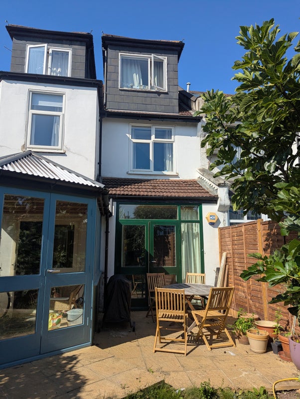 Photo 1: Garden with outdoor seating