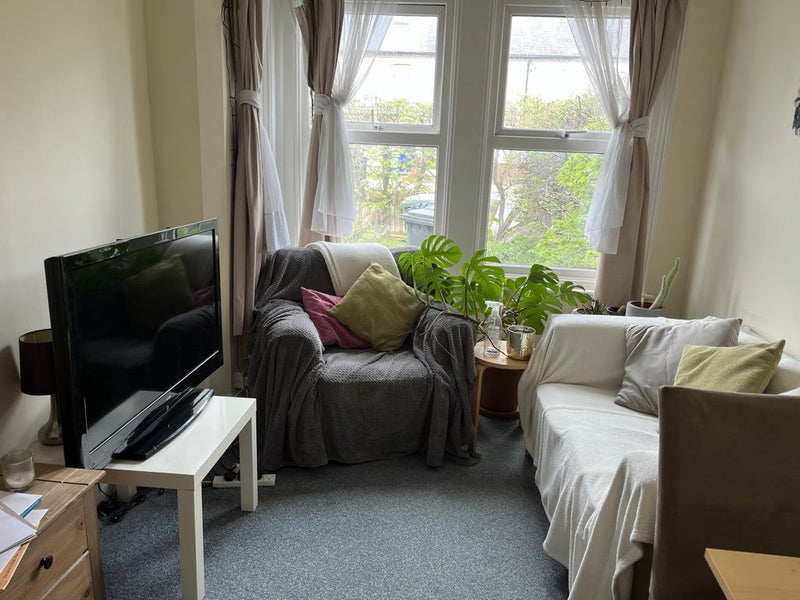 Photo 1: Shared living space