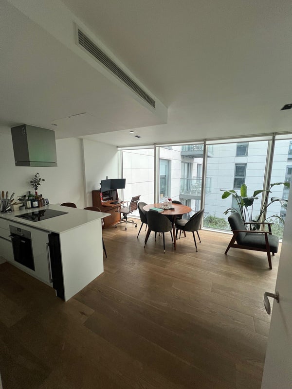 Photo 1: Kitchen & Living Area