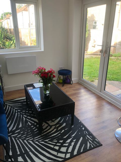 Photo 1: Shared Sitting Room