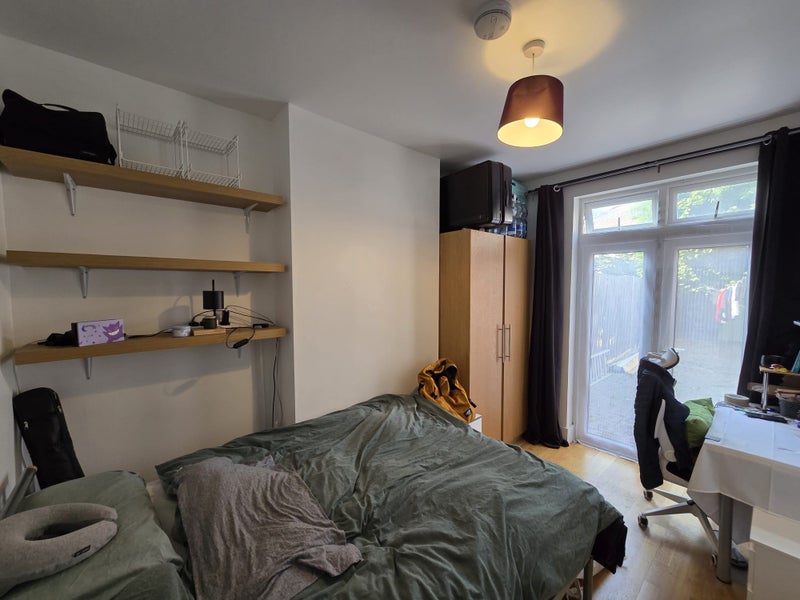 Photo 1: Double bed, study corner and wardrobe