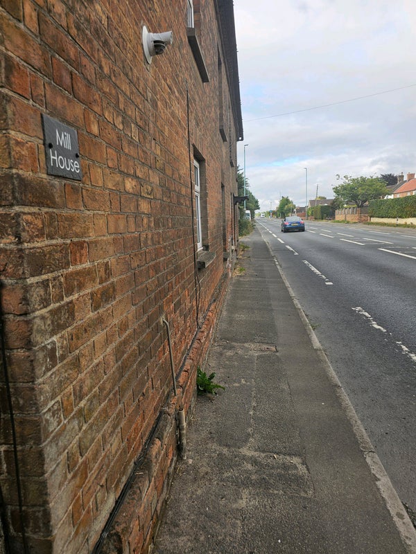 Photo 1: Front of house