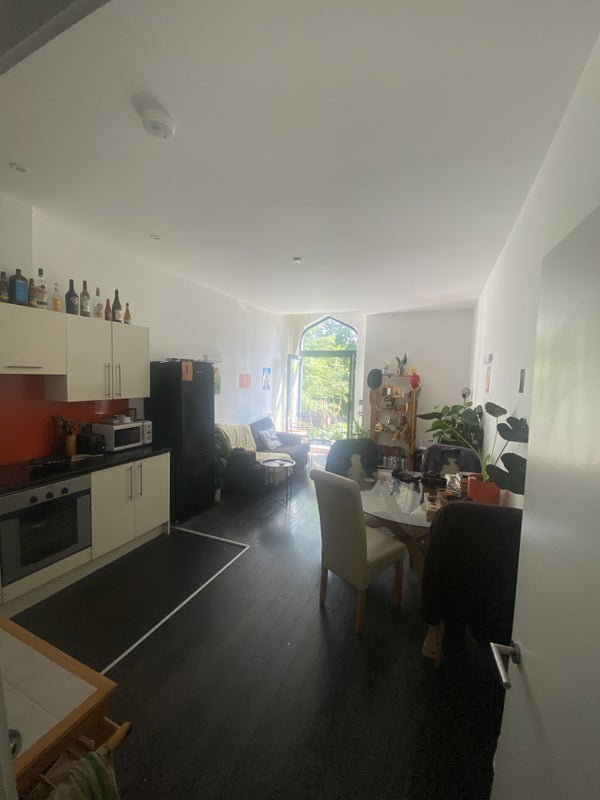 Photo 1: Kitchen / living area